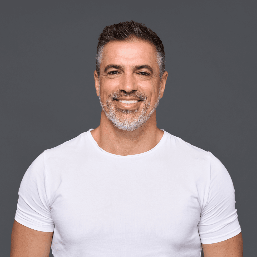 Confident man with neatly styled short hair and beard – representing professional gents’ hairdressing services at The Pamper Suite in Bexley.