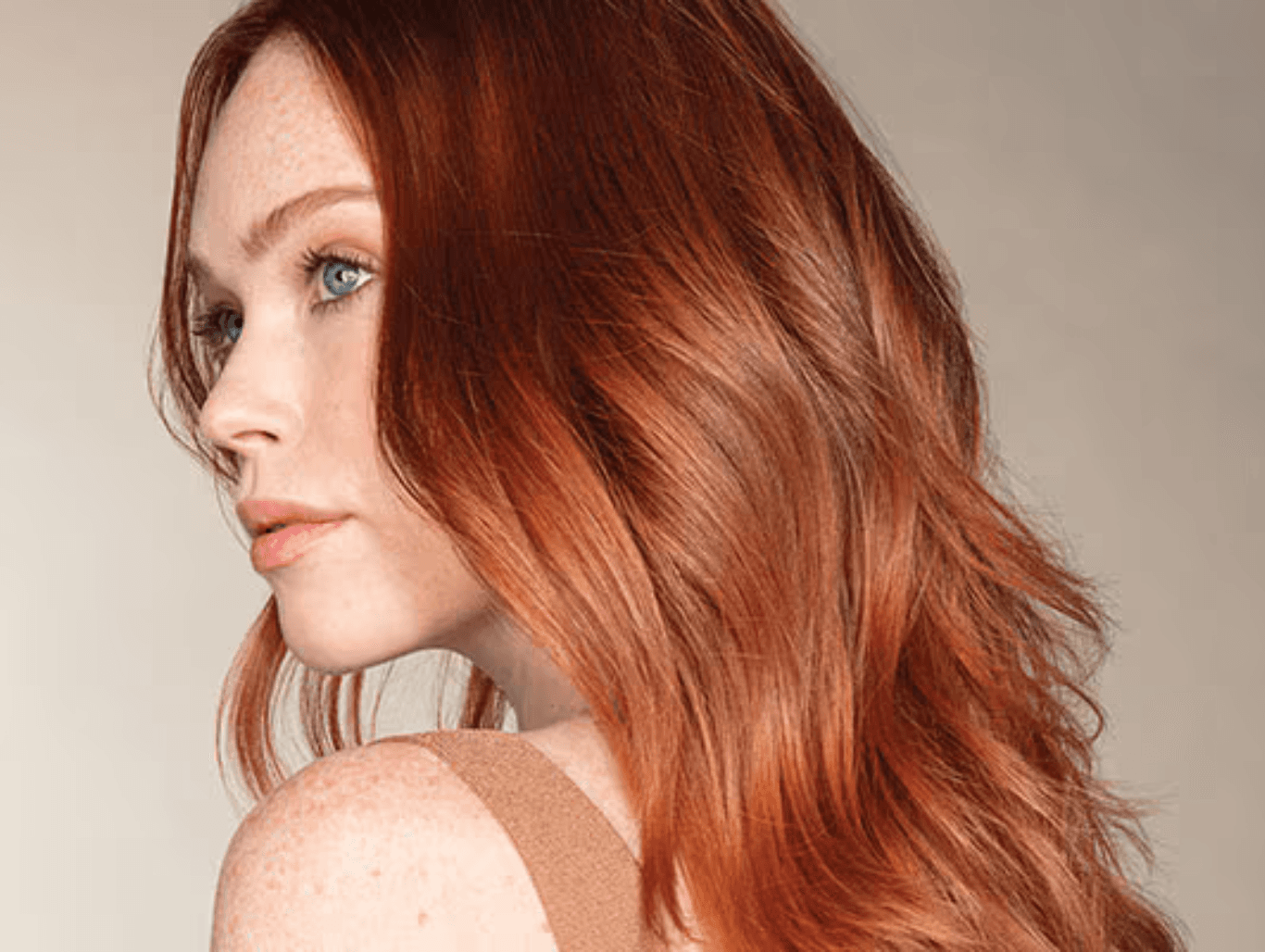 Close-up of full head colour being applied to a client’s hair in sections using Aveda professional colour — representing expert colour services at The Pamper Suite in Bexley.