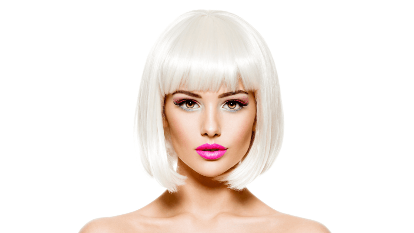 Woman with sleek platinum blonde bob and fringe, wearing bright pink lipstick, representing a polished blowdry and finish result at The Pamper Suite in Bexley.