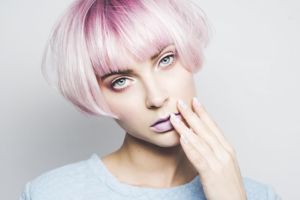 Model with pastel pink bob hairstyle after a soothing Aveda Scalp Solutions refresh treatment at The Pamper Suite in Bexley.